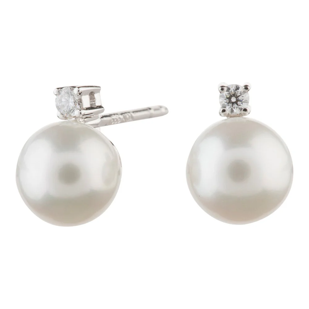 14kt. hvidgulds ørestik m. fvkp og 0,053 ct TW/SI